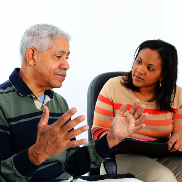 woman listening to a man talking