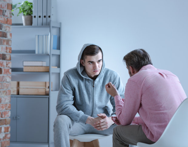 teenager boy undergo counseling